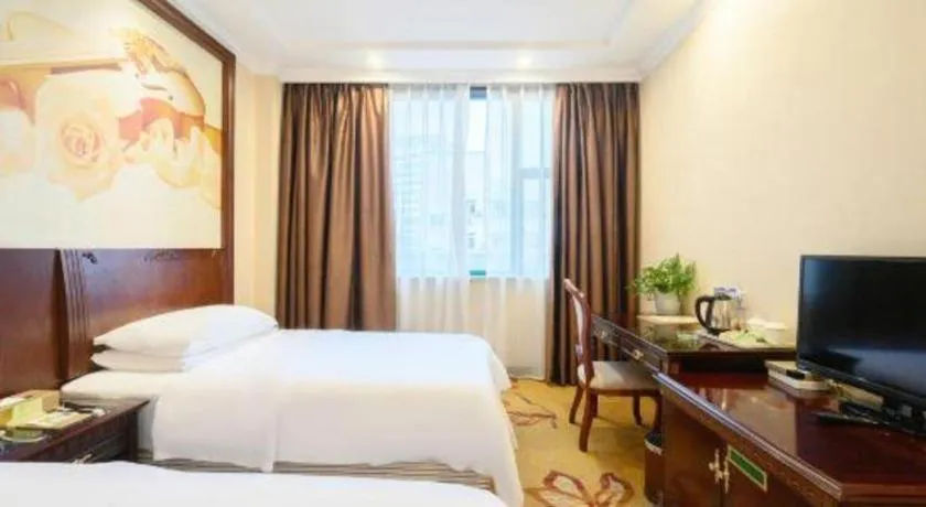 Bed in Vienna Classic Hotel Zhangzhou Longchi Center