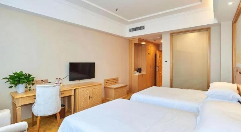 Bed in Vienna Classic Hotel Zhangzhou Longchi Center