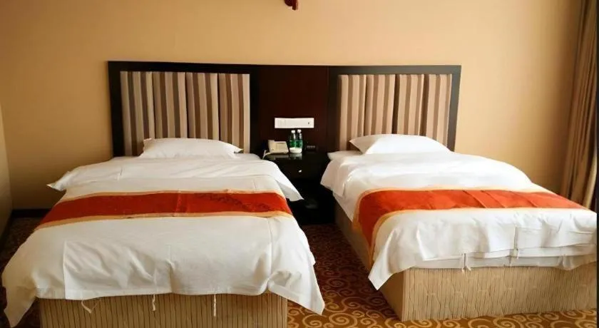Bed in Vienna Hotel Chengdu Exhibition Center