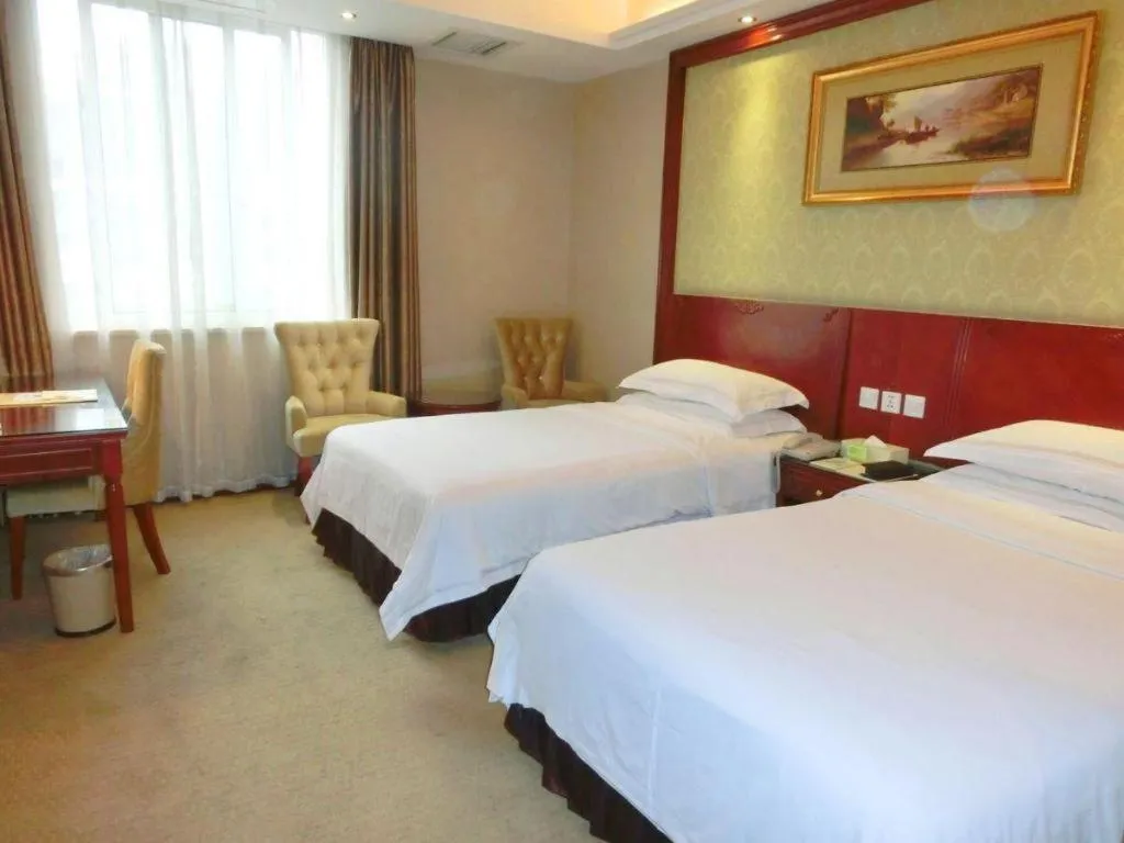 Bed in Vienna Hotel Chengdu Exhibition Center