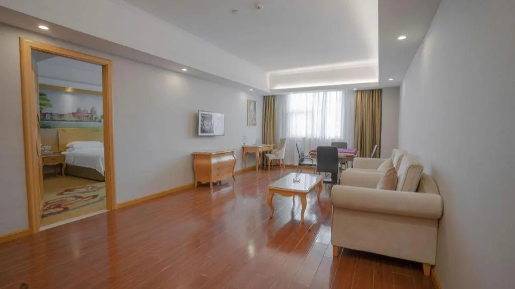 Bed in Vienna Hotel Guangdong Huizhou Lilin North Railway Station