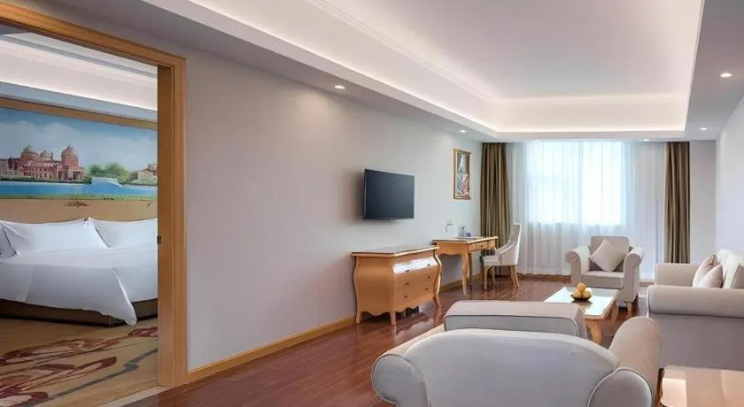 Bed in Vienna Hotel Guangdong Huizhou Lilin North Railway Station