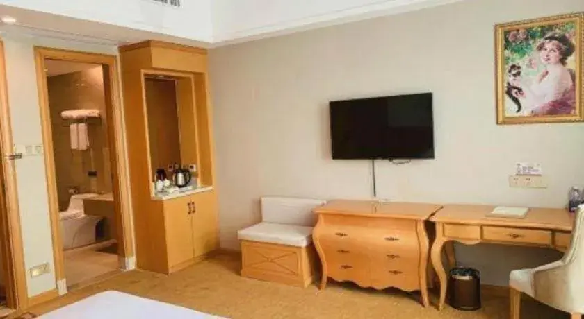 Bed in Vienna Hotel Guangdong Huizhou Lilin North Railway Station Bed in Vienna Hotel Guangdong Huizhou Lilin North Railway Station