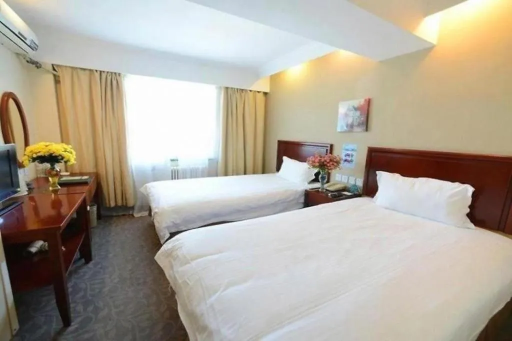 Bed in GreenTree Inn Tongxiang Chongfuzhen World Fur Center Branch