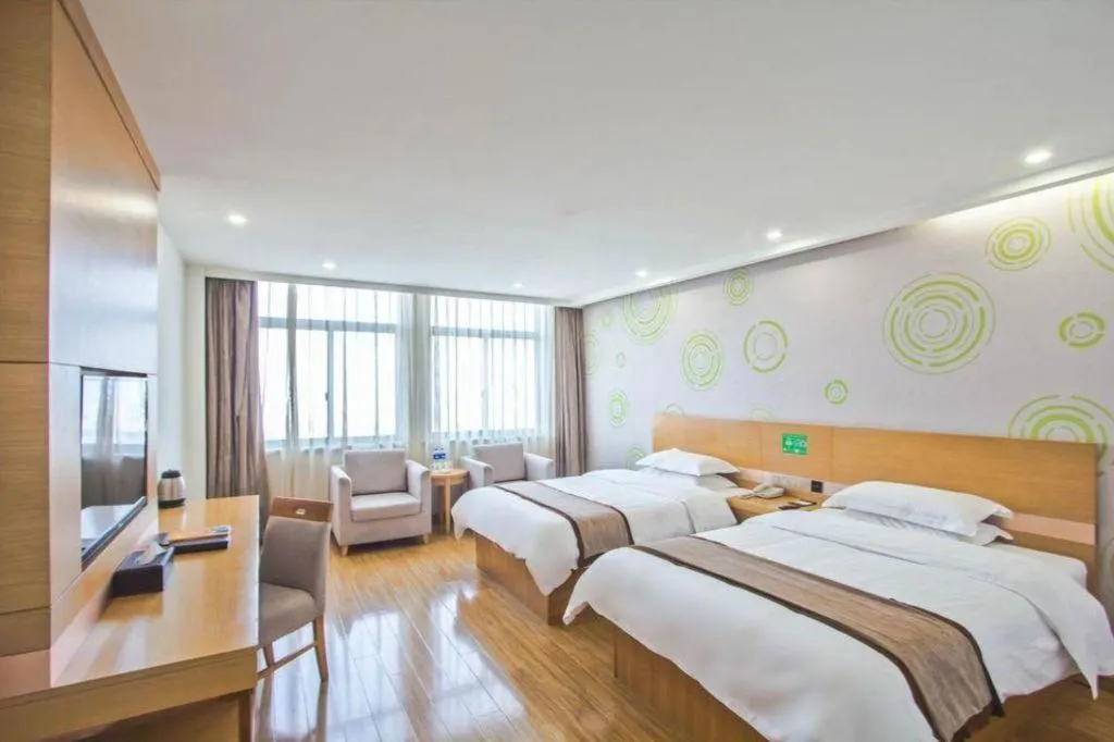Bed in GreenTree Inn Tongxiang Chongfuzhen World Fur Center Branch