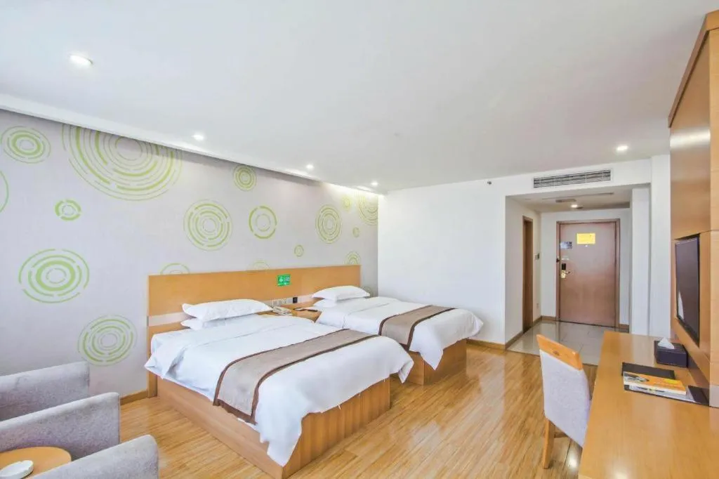 Bed in GreenTree Inn Tongxiang Chongfuzhen World Fur Center Branch