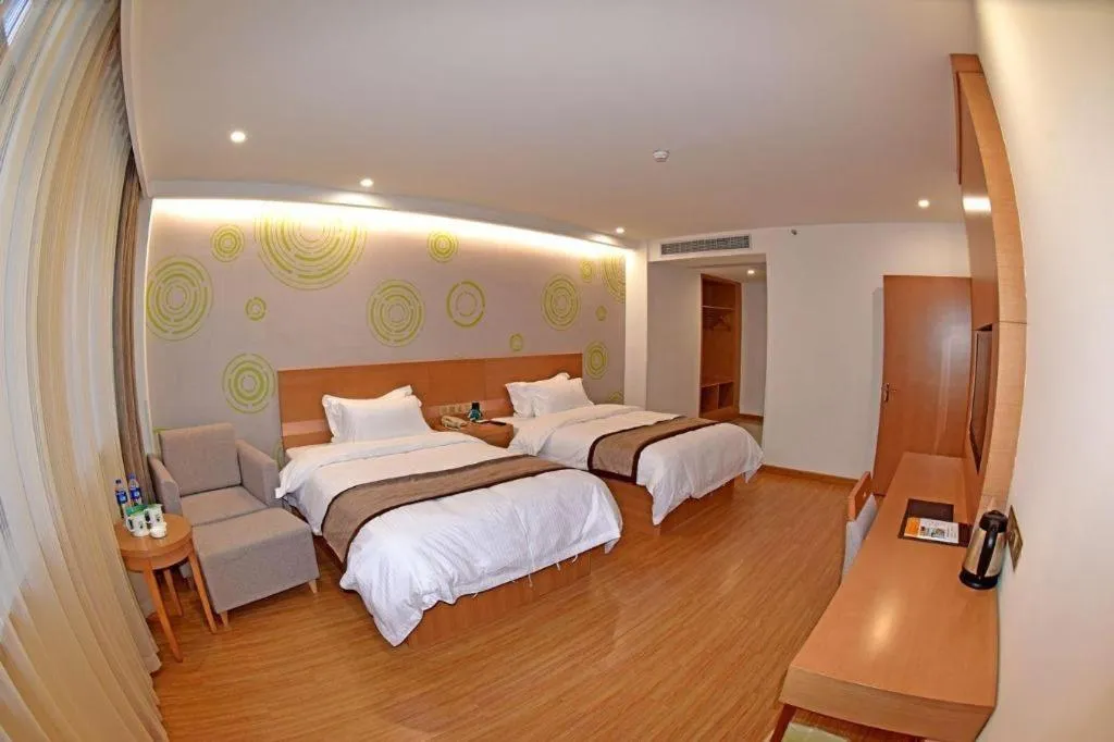 Bed in GreenTree Inn Tongxiang Chongfuzhen World Fur Center Branch