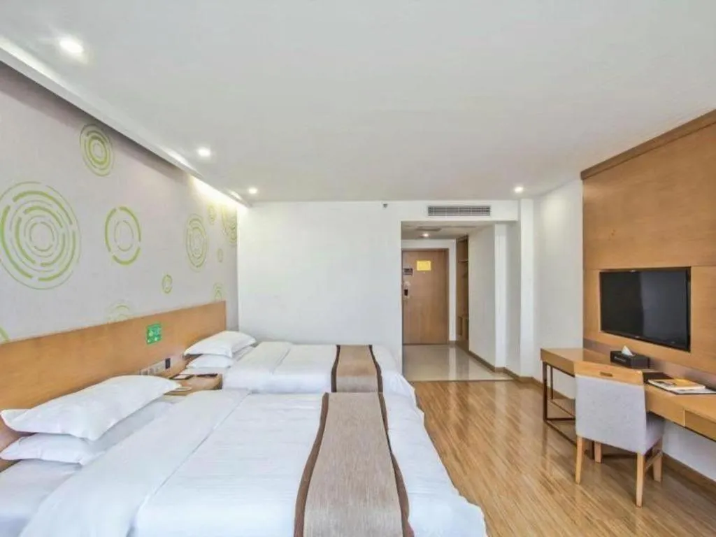 Bed in GreenTree Inn Tongxiang Chongfuzhen World Fur Center Branch