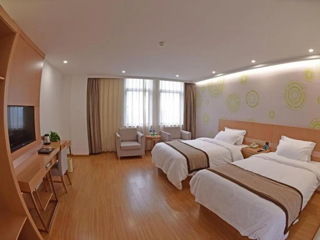 Bed in GreenTree Inn Tongxiang Chongfuzhen World Fur Center Branch