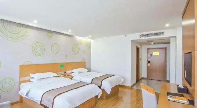 Bed in GreenTree Inn Tongxiang Chongfuzhen World Fur Center Branch Bed in GreenTree Inn Tongxiang Chongfuzhen World Fur Center Branch