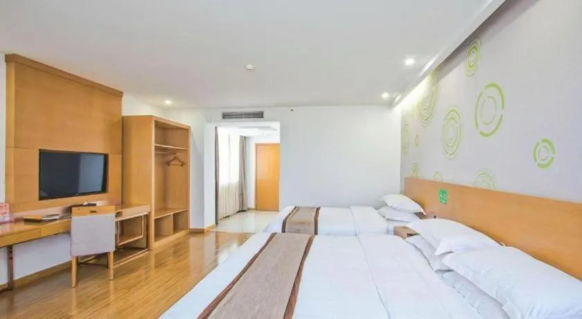 Bed in GreenTree Inn Tongxiang Chongfuzhen World Fur Center Branch
