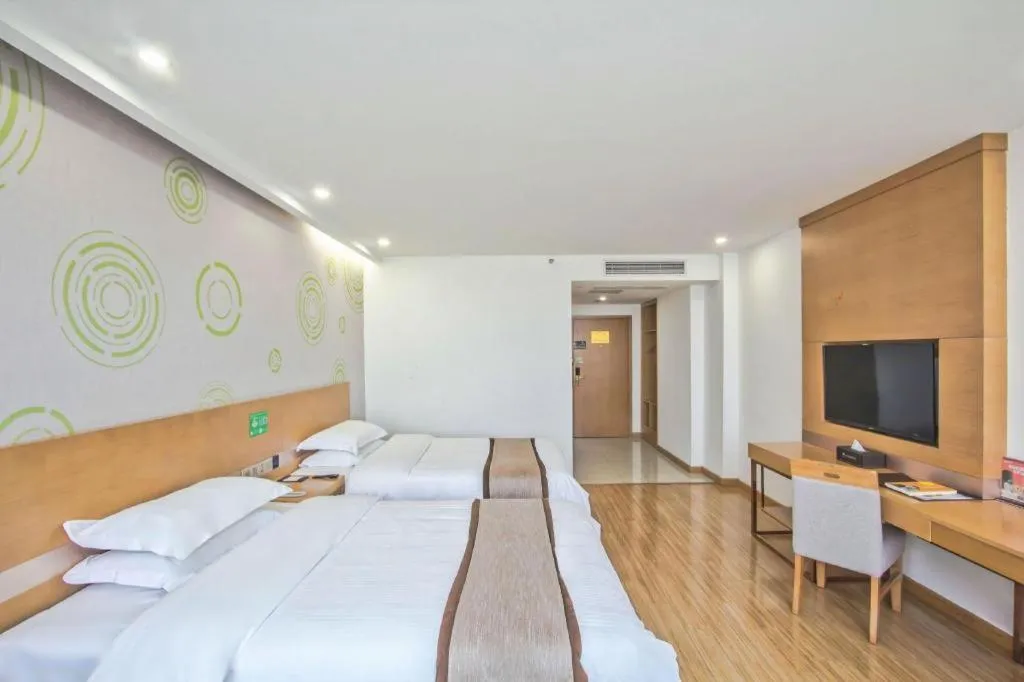 Bed in GreenTree Inn Tongxiang Chongfuzhen World Fur Center Branch