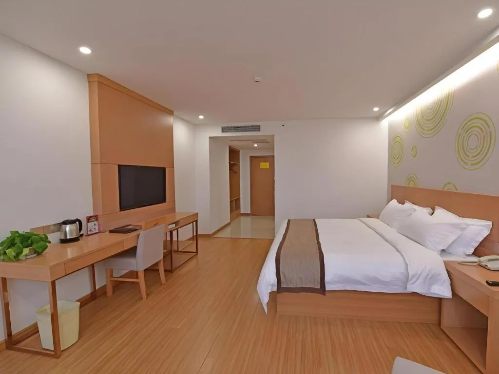 Bed in GreenTree Inn Tongxiang Chongfuzhen World Fur Center Branch