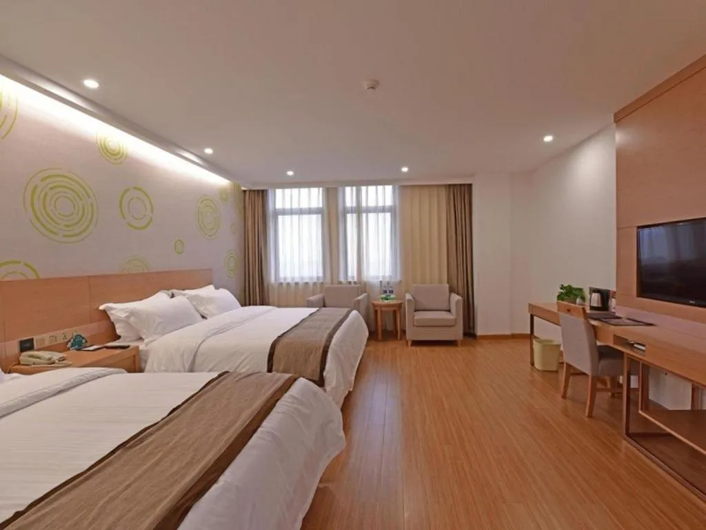 Bed in GreenTree Inn Tongxiang Chongfuzhen World Fur Center Branch