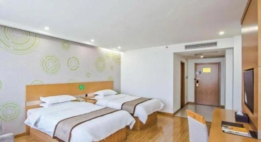 Bed in GreenTree Inn Tongxiang Chongfuzhen World Fur Center Branch