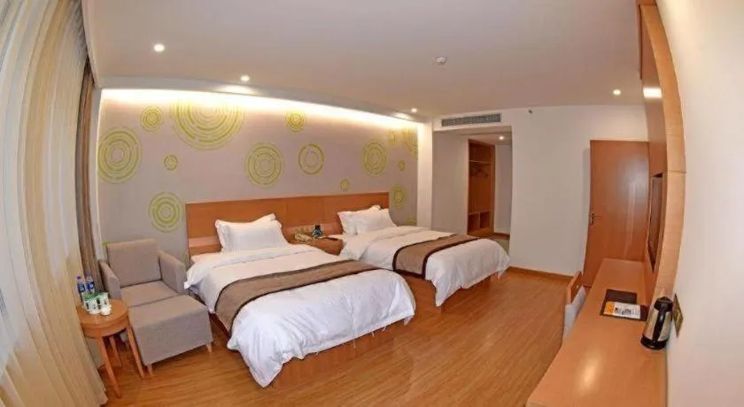 Bed in GreenTree Inn Tongxiang Chongfuzhen World Fur Center Branch