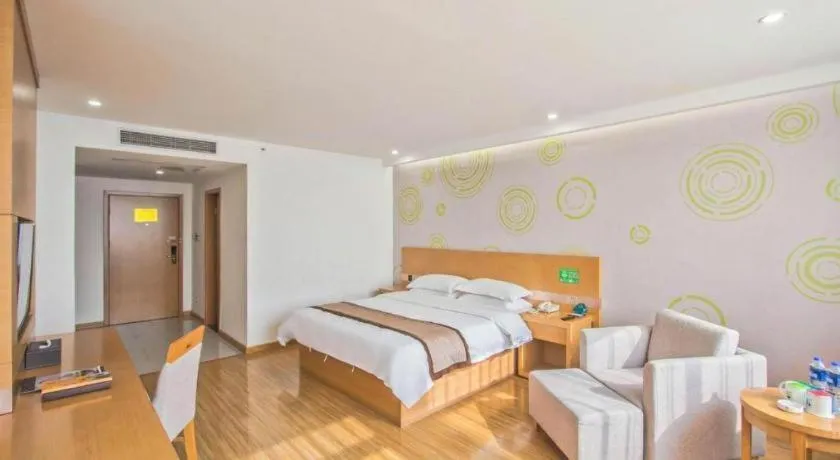 Bed in GreenTree Inn Tongxiang Chongfuzhen World Fur Center Branch