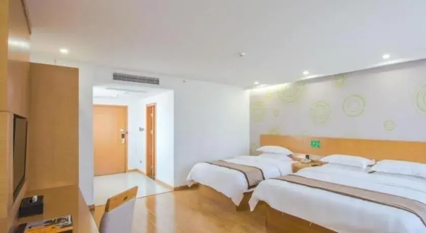 Bed in GreenTree Inn Tongxiang Chongfuzhen World Fur Center Branch Bed in GreenTree Inn Tongxiang Chongfuzhen World Fur Center Branch