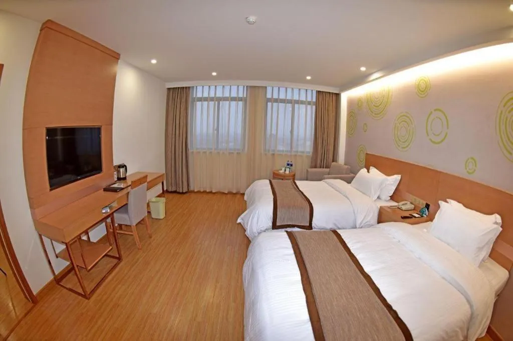Bed in GreenTree Inn Tongxiang Chongfuzhen World Fur Center Branch