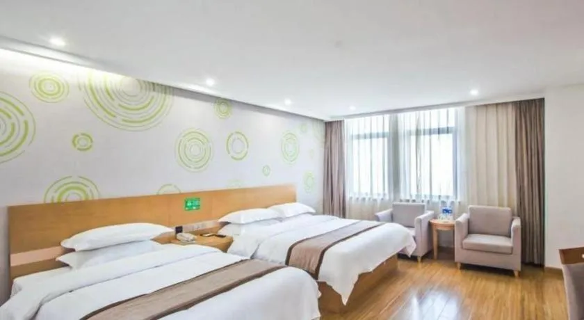 Bed in GreenTree Inn Tongxiang Chongfuzhen World Fur Center Branch