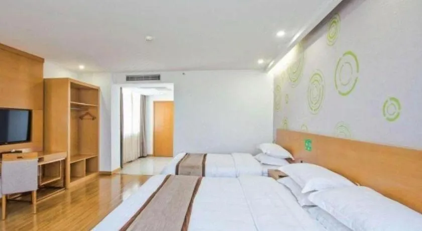 Bed in GreenTree Inn Tongxiang Chongfuzhen World Fur Center Branch