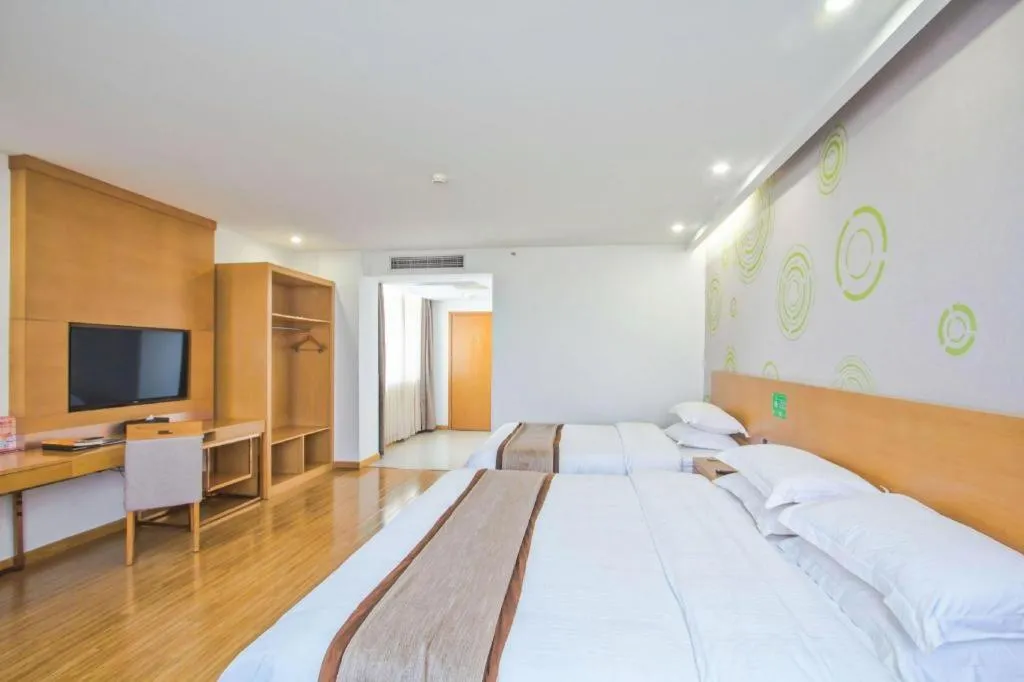 Bed in GreenTree Inn Tongxiang Chongfuzhen World Fur Center Branch