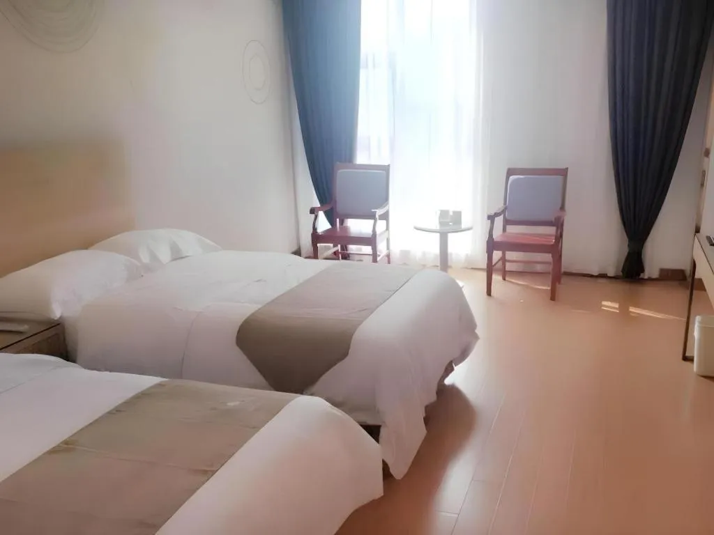 Bed in GreeTree Inn Huainan Jinjialing Road Oriental General Hospital