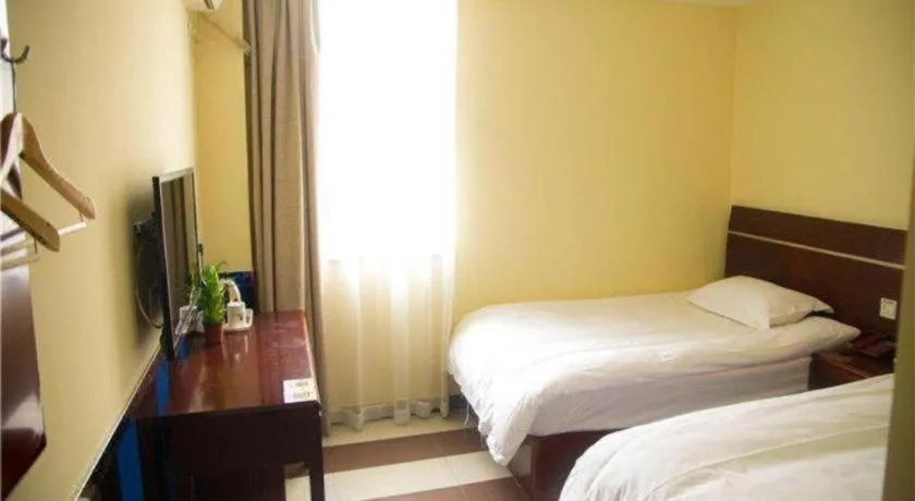 Bed in Shell Hotel Shanghai Baoshan Meilanhu Luosheng Road