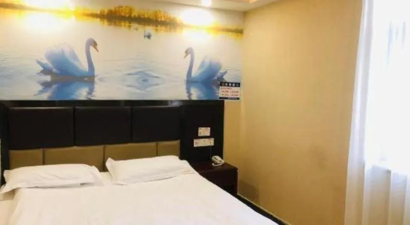 Bed in Shell Hotel Shanghai Baoshan Meilanhu Luosheng Road