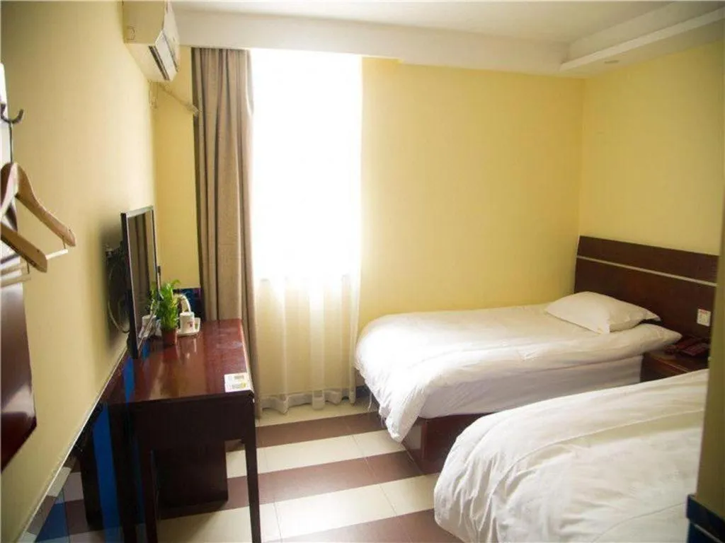 Bed in Shell Hotel Shanghai Baoshan Meilanhu Luosheng Road