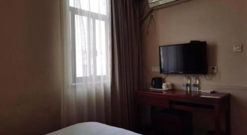 Bed in Shell Hotel Shanghai Baoshan Meilanhu Luosheng Road