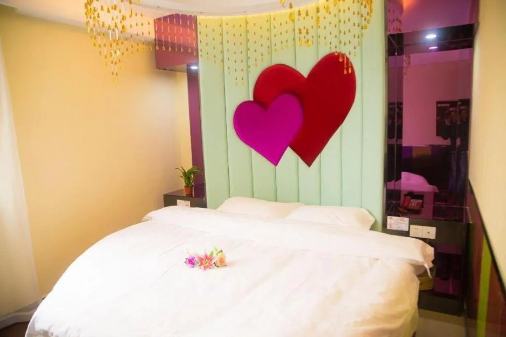 Bed in Shell Hotel Shanghai Baoshan Meilanhu Luosheng Road