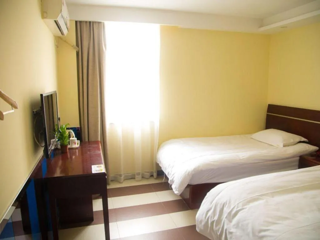 Bed in Shell Hotel Shanghai Baoshan Meilanhu Luosheng Road