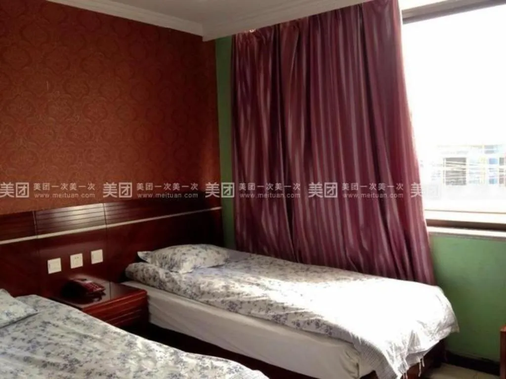 Bed in Shell Hotel Shanghai Baoshan Meilanhu Luosheng Road