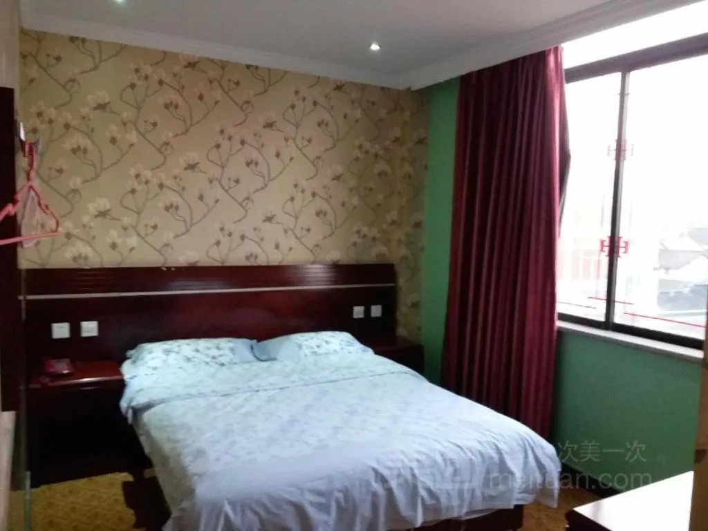 Bed in Shell Hotel Shanghai Baoshan Meilanhu Luosheng Road