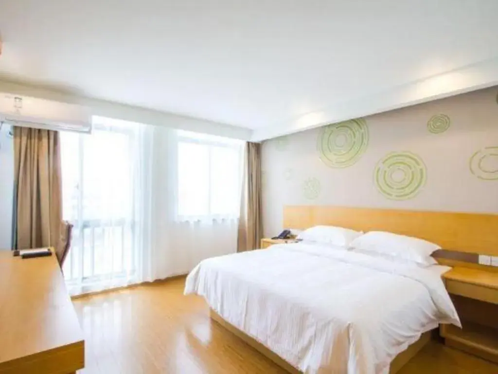 Bed in GreenTree Inn Jiaxing Qixing Town Goverment Bed in GreenTree Inn Jiaxing Qixing Town Goverment