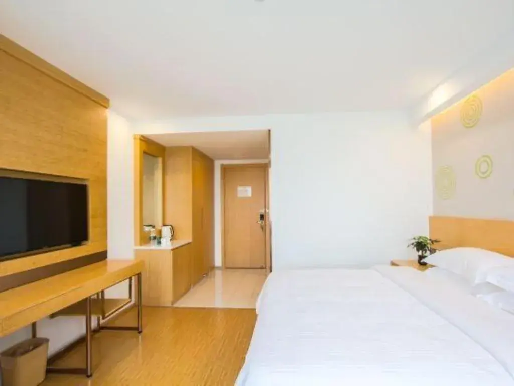 Bed in GreenTree Inn Jiaxing Qixing Town Goverment Bed in GreenTree Inn Jiaxing Qixing Town Goverment