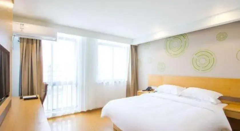 Bed in GreenTree Inn Jiaxing Qixing Town Goverment Bed in GreenTree Inn Jiaxing Qixing Town Goverment
