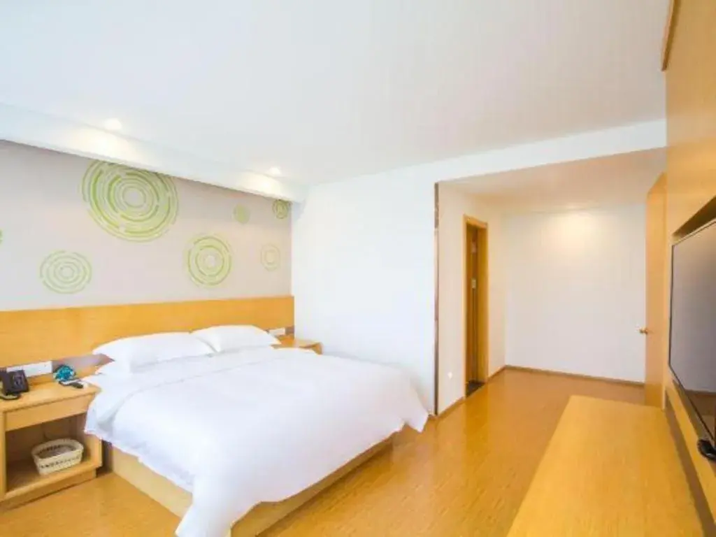 Bed in GreenTree Inn Jiaxing Qixing Town Goverment Bed in GreenTree Inn Jiaxing Qixing Town Goverment