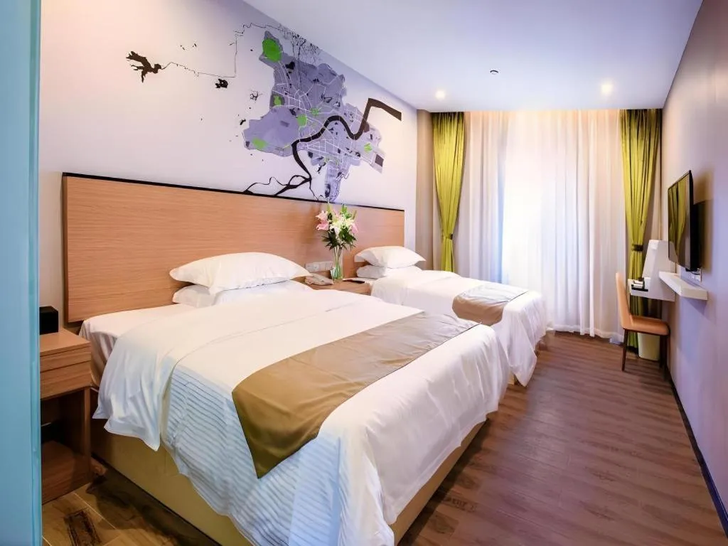 Bed in Vatica Hangzhou Xiasha Media College Hotel