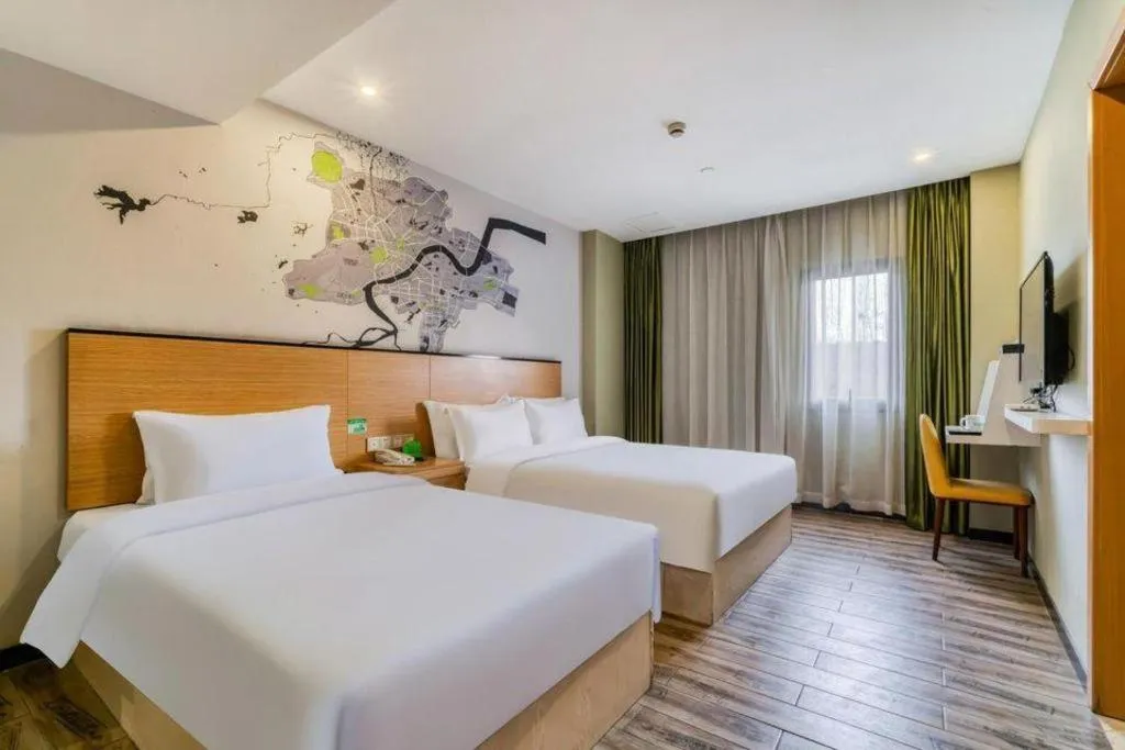 Bed in Vatica Hangzhou Xiasha Media College Hotel