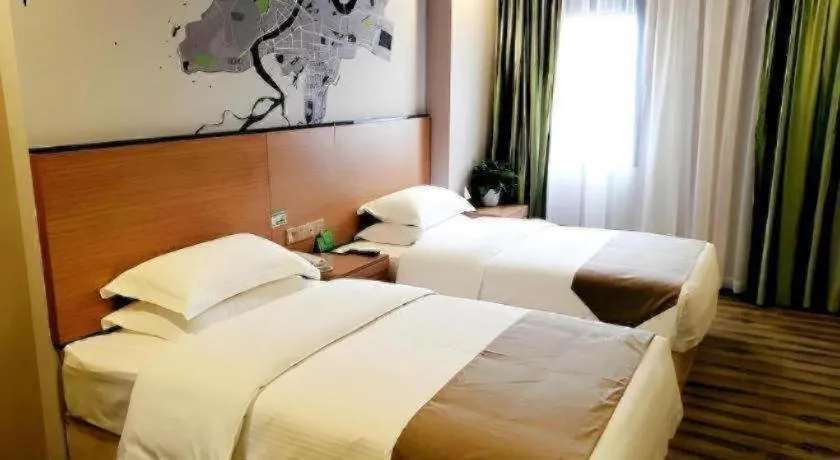 Bed in Vatica Hangzhou Xiasha Media College Hotel