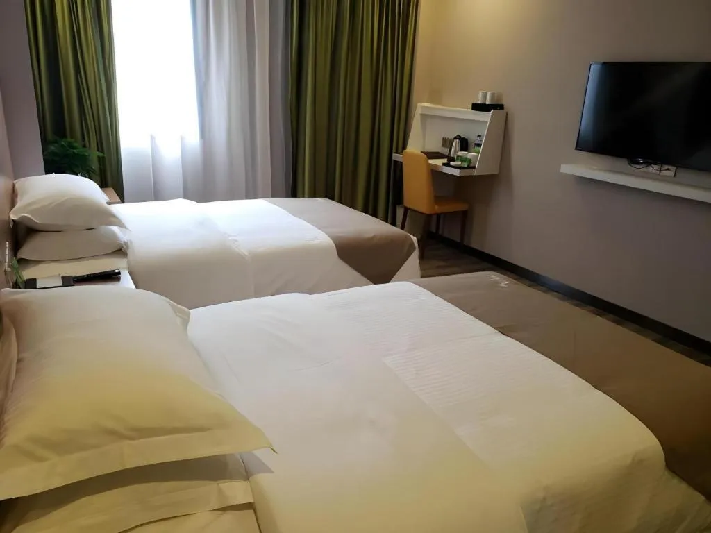 Bed in Vatica Hangzhou Xiasha Media College Hotel