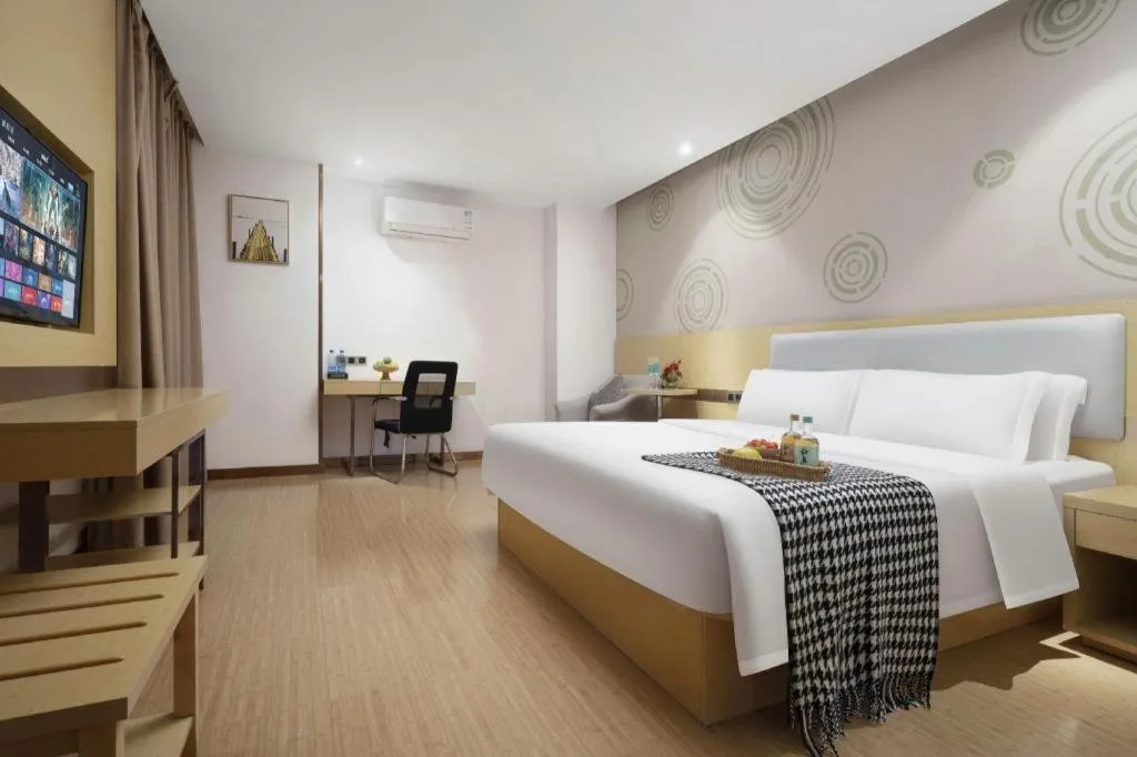 Bed in GreenTree Inn Huanggang City Wuxue City Kanjiang Avenue