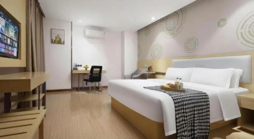 Bed in GreenTree Inn Huanggang City Wuxue City Kanjiang Avenue