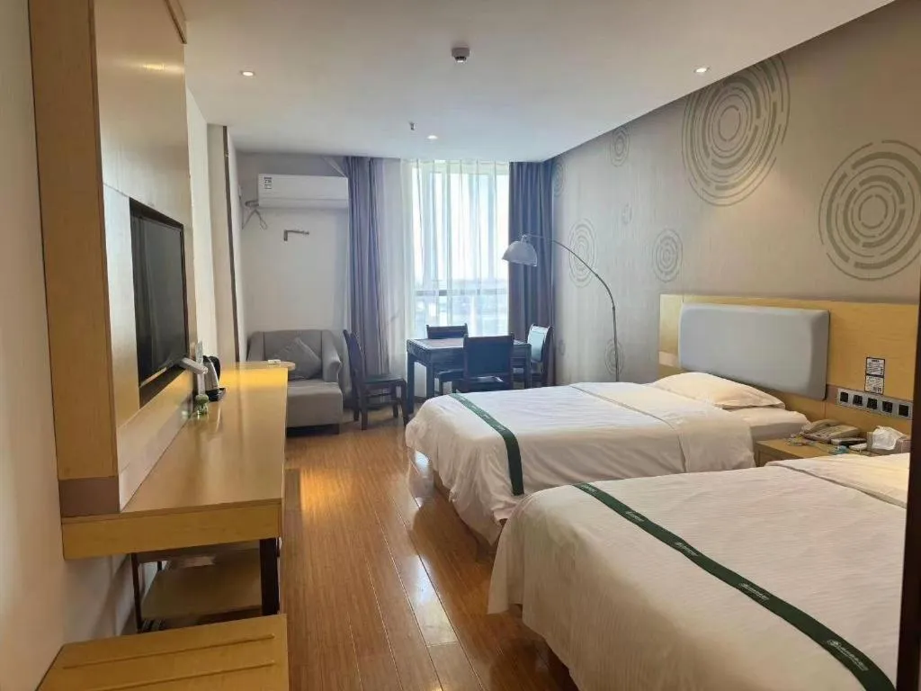 Bed in GreenTree Inn Huanggang City Wuxue City Kanjiang Avenue