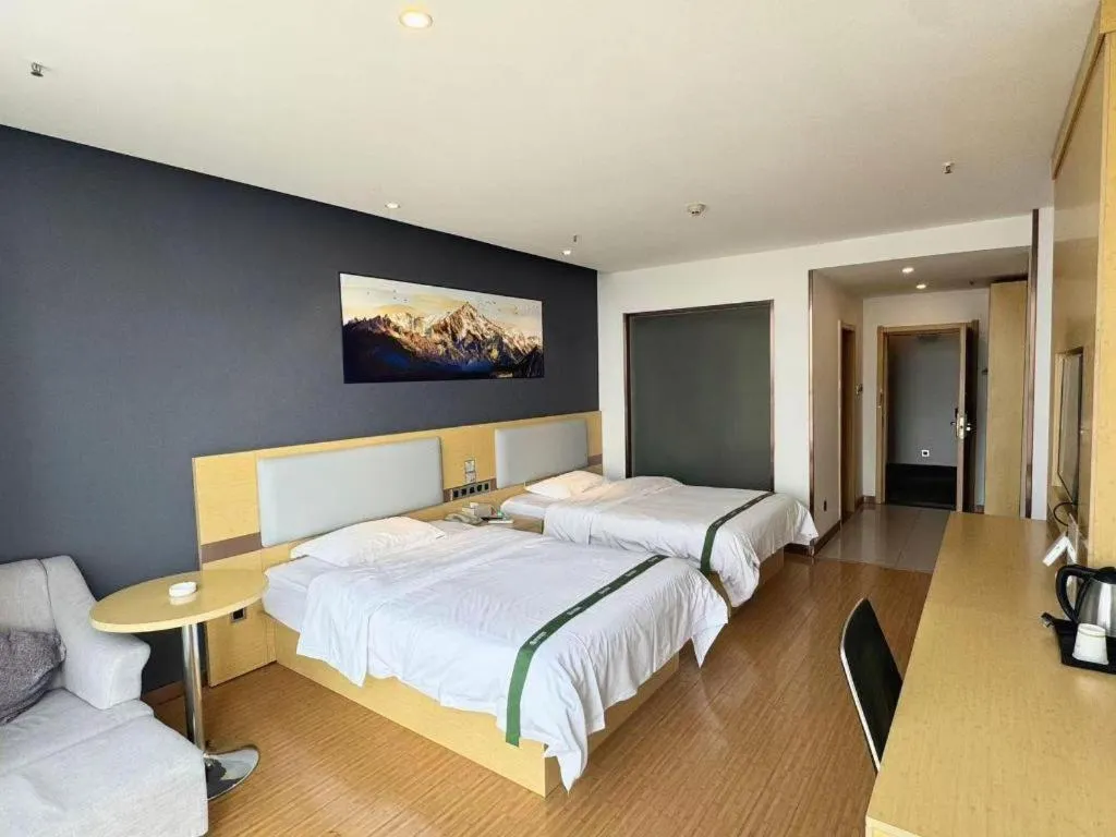 Bed in GreenTree Inn Huanggang City Wuxue City Kanjiang Avenue