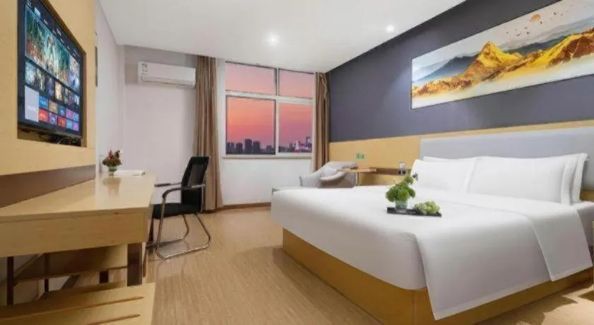 Bed in GreenTree Inn Huanggang City Wuxue City Kanjiang Avenue