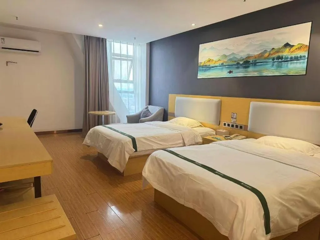 Bed in GreenTree Inn Huanggang City Wuxue City Kanjiang Avenue