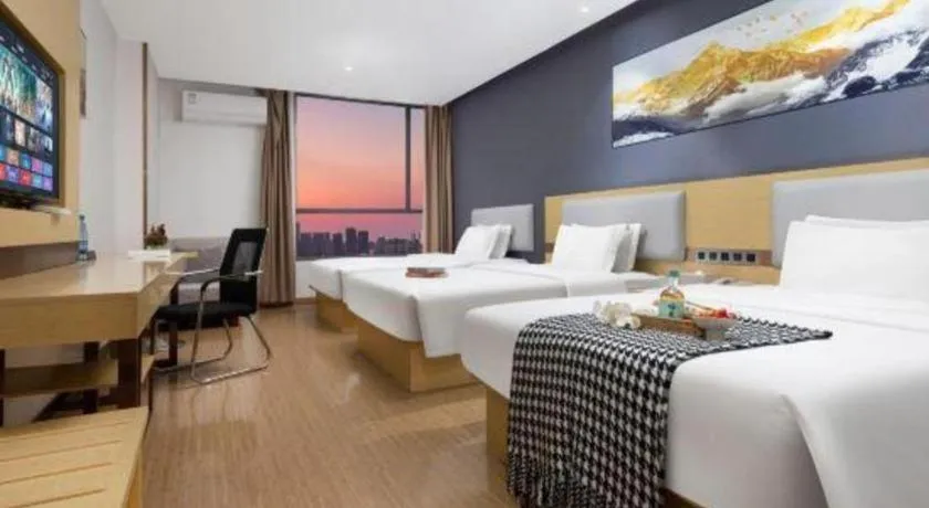 Bed in GreenTree Inn Huanggang City Wuxue City Kanjiang Avenue